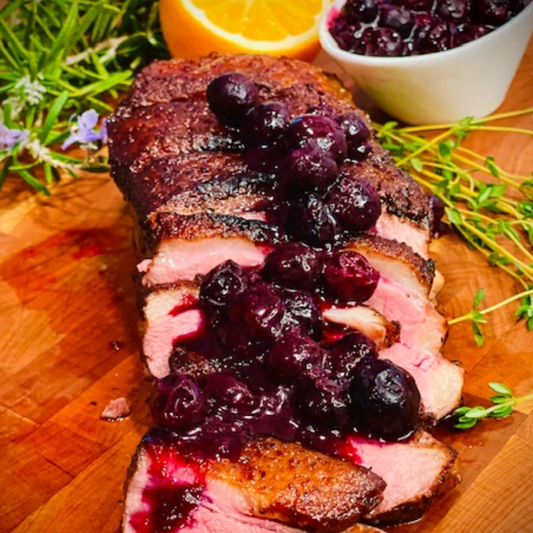 Scored Duck w/Blueberry Orange Sauce